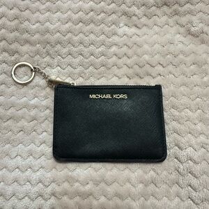 Michael kors wallet, black. Small to carry but holds a lot